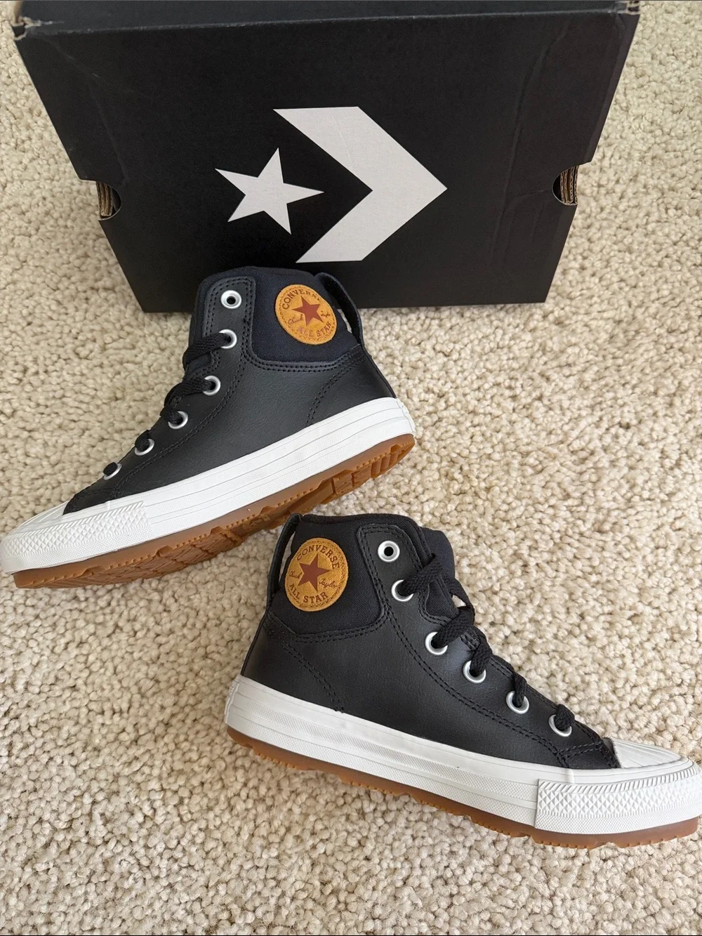 Converse Kids' Black High-Top leather sneakers